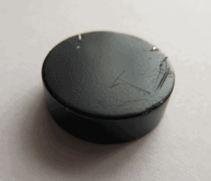 damaged polyepoxide surface treatment of the magnet
