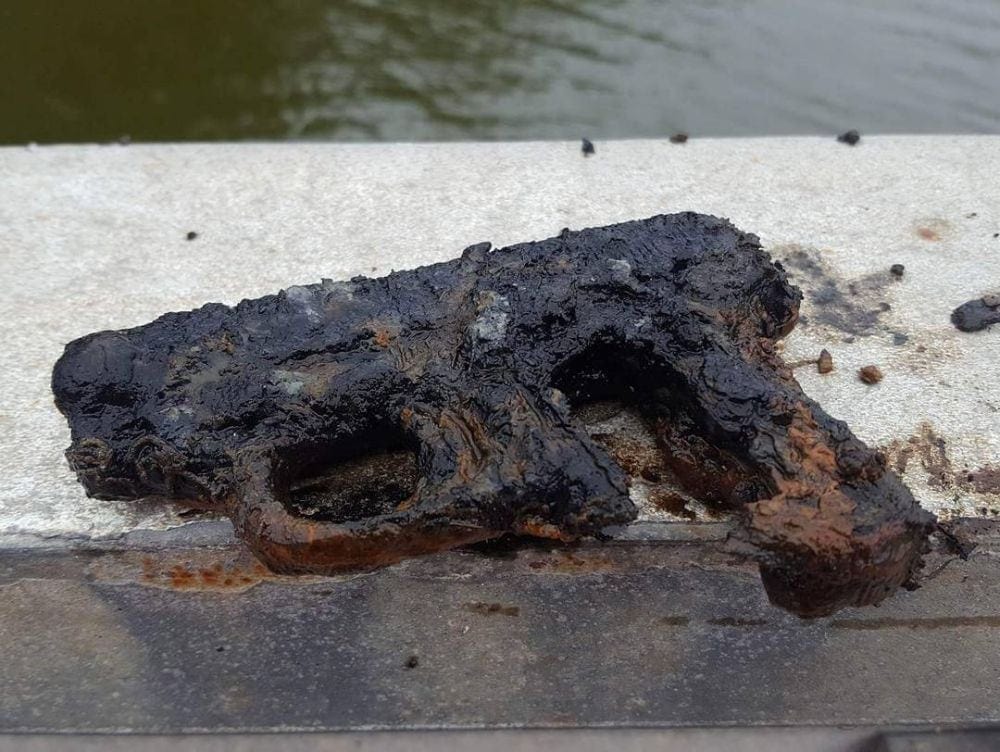 magnet fishing finding-gun