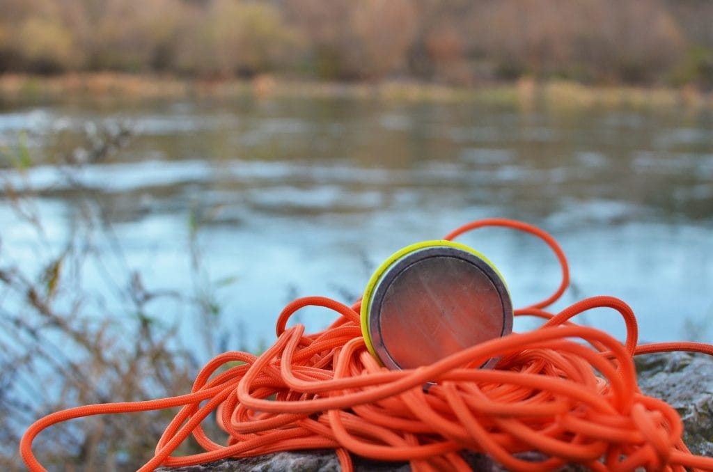 Magnet with rope by a riverbank
