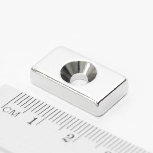 Neodymium magnet, block, 20x10x5 mm, with a hole (north pole on the countersunk side) - N38