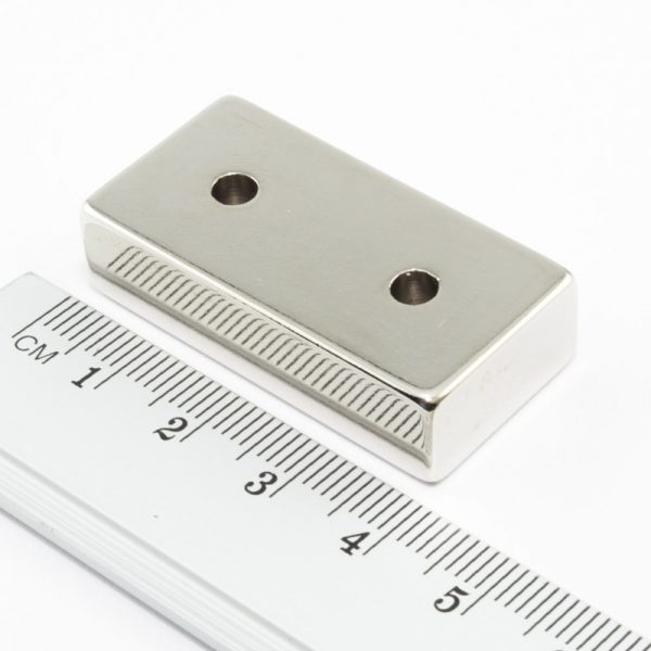 Neodymium magnet, block, 40x20x10 mm, with 2 holes (south pole on the countersunk side) - N38