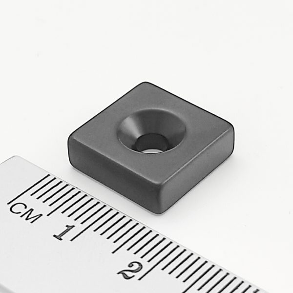 Neodymium magnet, block, 15×15×5 mm, with hole M4 (north pole on the countersunk side) epoxy - N42