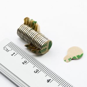 Neodymium magnet, disc, 10x1 mm, self-adhesive (south pole on side without backing) - N38