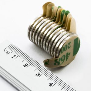 Neodymium magnet, disc, 20x2 mm, self-adhesive (north pole on side without backing) - N38