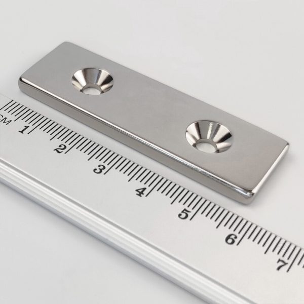 Neodymium magnet, block, 60×20×4 mm, with 2 holes M4 (north pole on the countersunk side) - N38