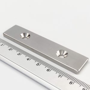 Neodymium magnet, block, 80×20×4 mm, with 2 holes M4 (north pole on the countersunk side) - N38