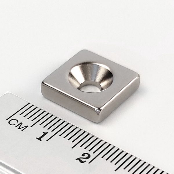 Neodymium magnet, block, 15×15×4 mm, with hole M4 (south pole on the countersunk side) - N38