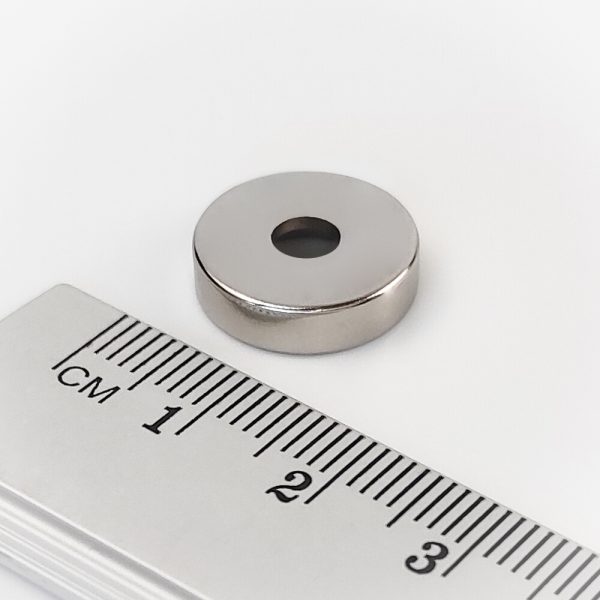 Neodymium magnet, disc, 15×4 mm, with hole M4 (north pole on the countersunk side) - N38 - Image 2