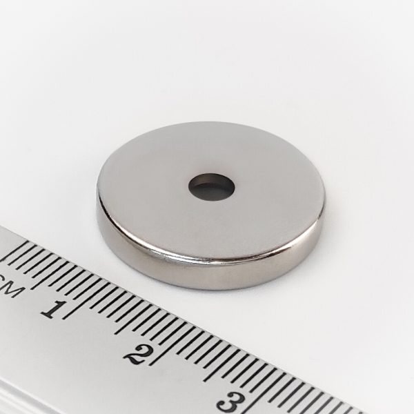 Neodymium magnet, disc, 23x4 mm, with hole M4