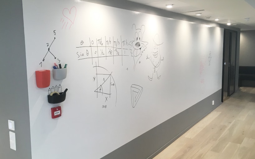 Magnetic whiteboard on the wall made of colours.