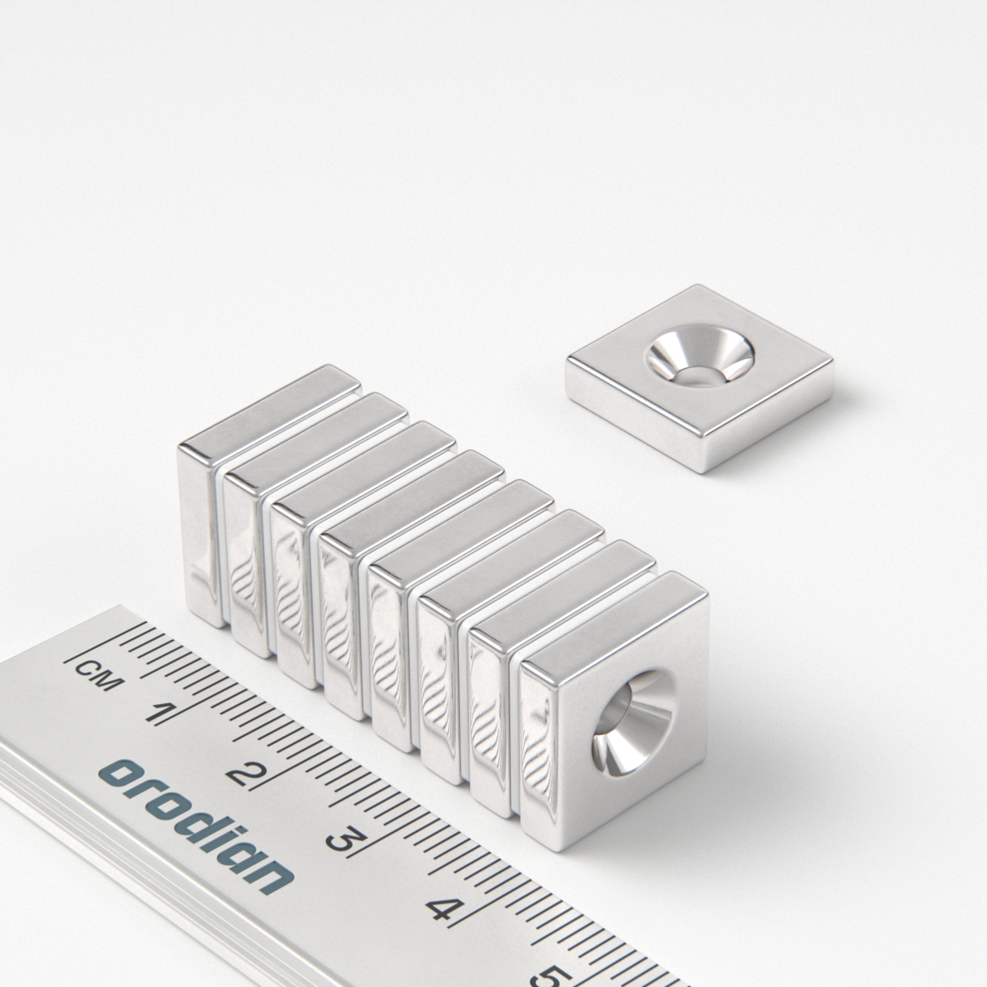 Neodymium magnet, block, 15×15×4 mm, with hole M4 (north pole on the countersunk side) - N38