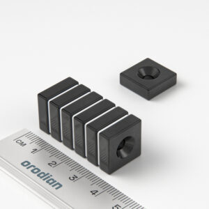 Neodymium magnet, block, 15×15×5 mm, with hole M4 (north pole on the countersunk side) epoxy - N42