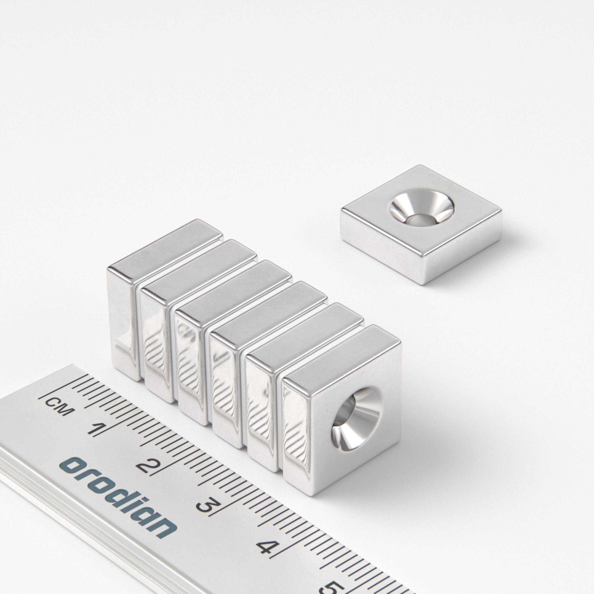 Neodymium magnet, block, 15×15×5 mm, with hole M4 (north pole on the countersunk side) - N38