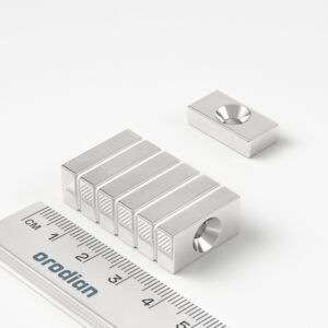 Neodymium magnet, block, 20×10×5 mm, with hole M4 (north pole on the countersunk side) - N38