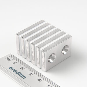 Neodymium magnet, block, 30×20×4 mm, with 2 holes M4 (north pole on the countersunk side) - N38