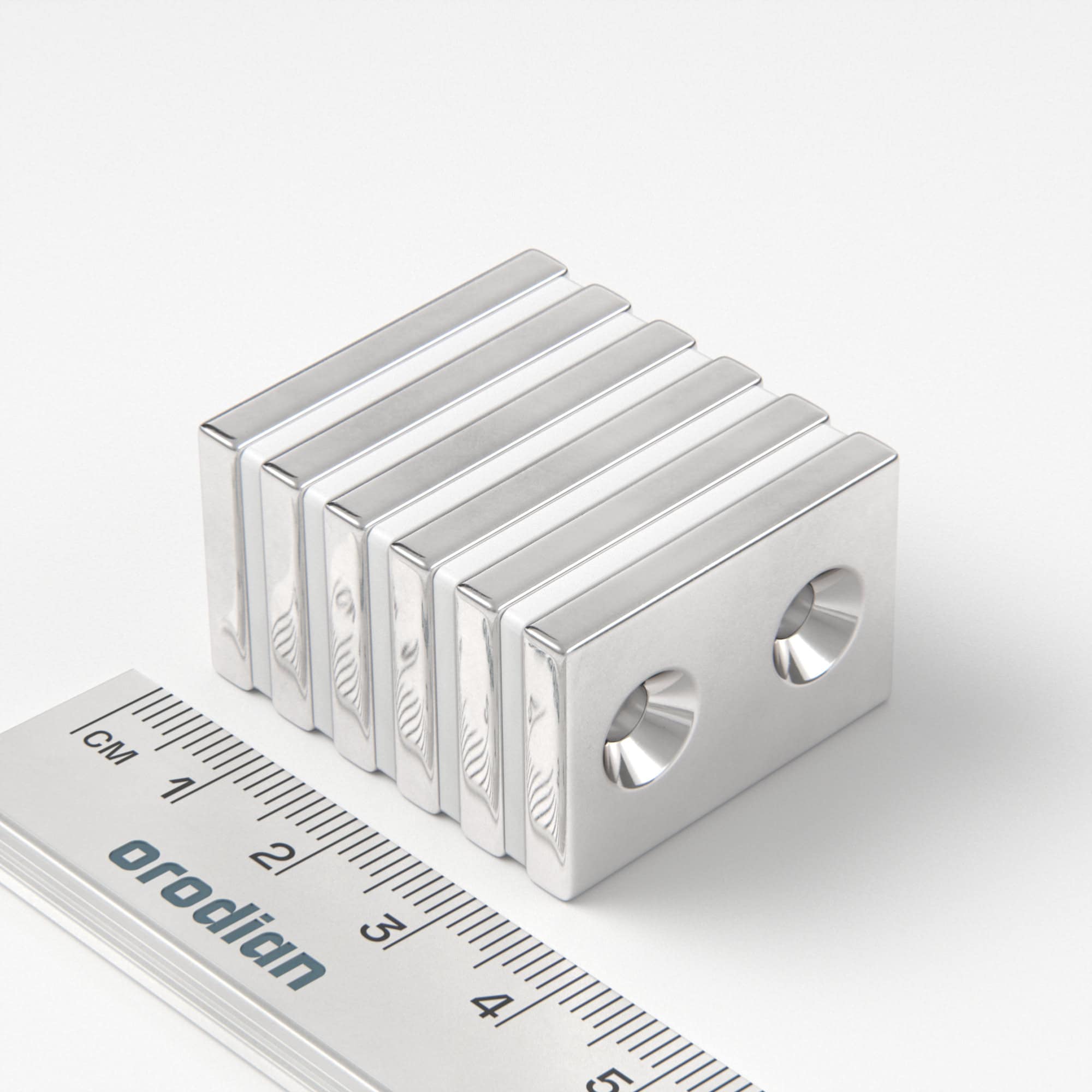 Neodymium magnet, block, 30×20×4 mm, with 2 holes M4 (south pole on the countersunk side) - N38