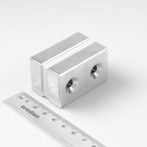 Neodymium magnet, block, 50×30×13 mm, with 2 holes M6 (north pole on the countersunk side) - N45