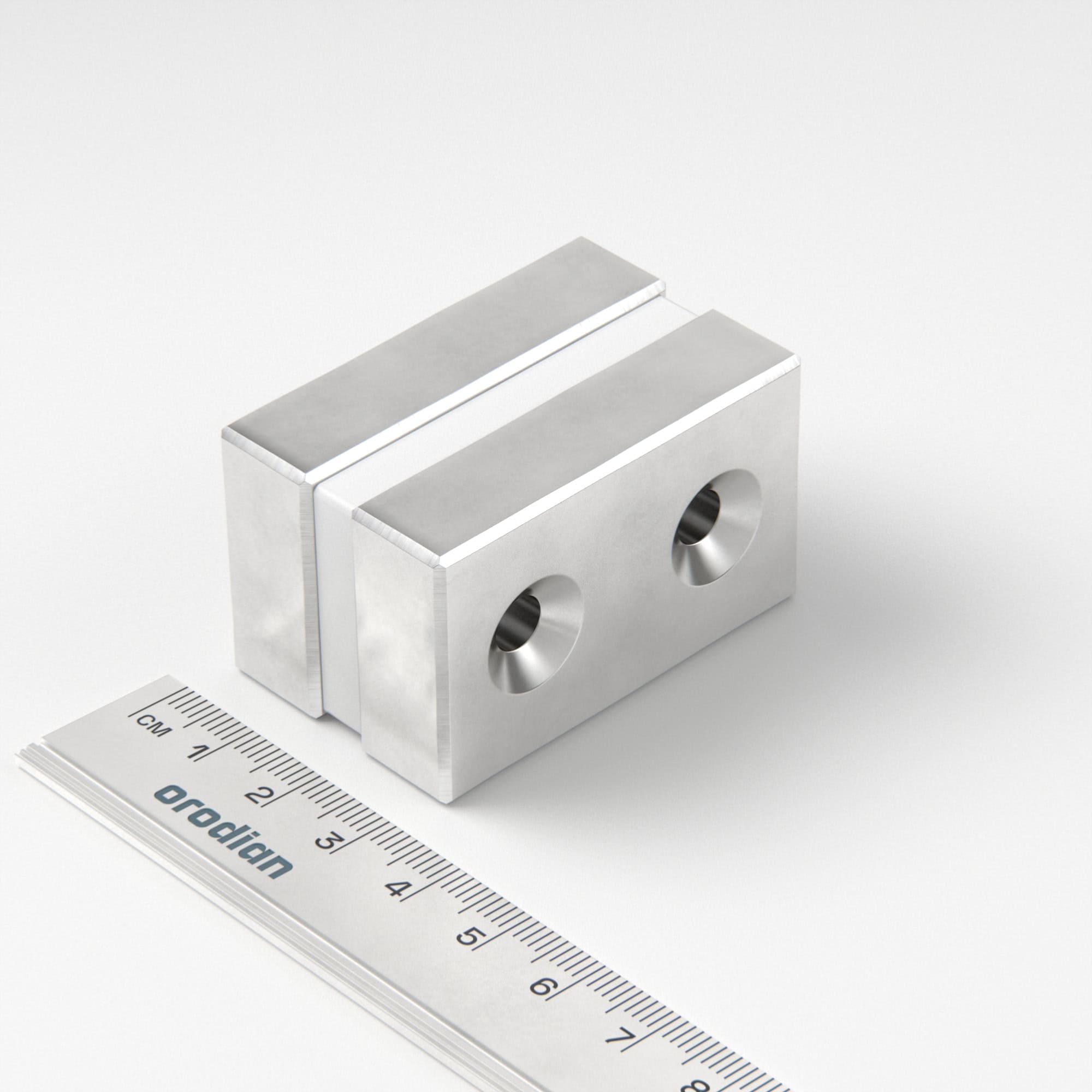 Neodymium magnet, block, 50×30×13 mm, with 2 holes M6 (north pole on the countersunk side) - N45
