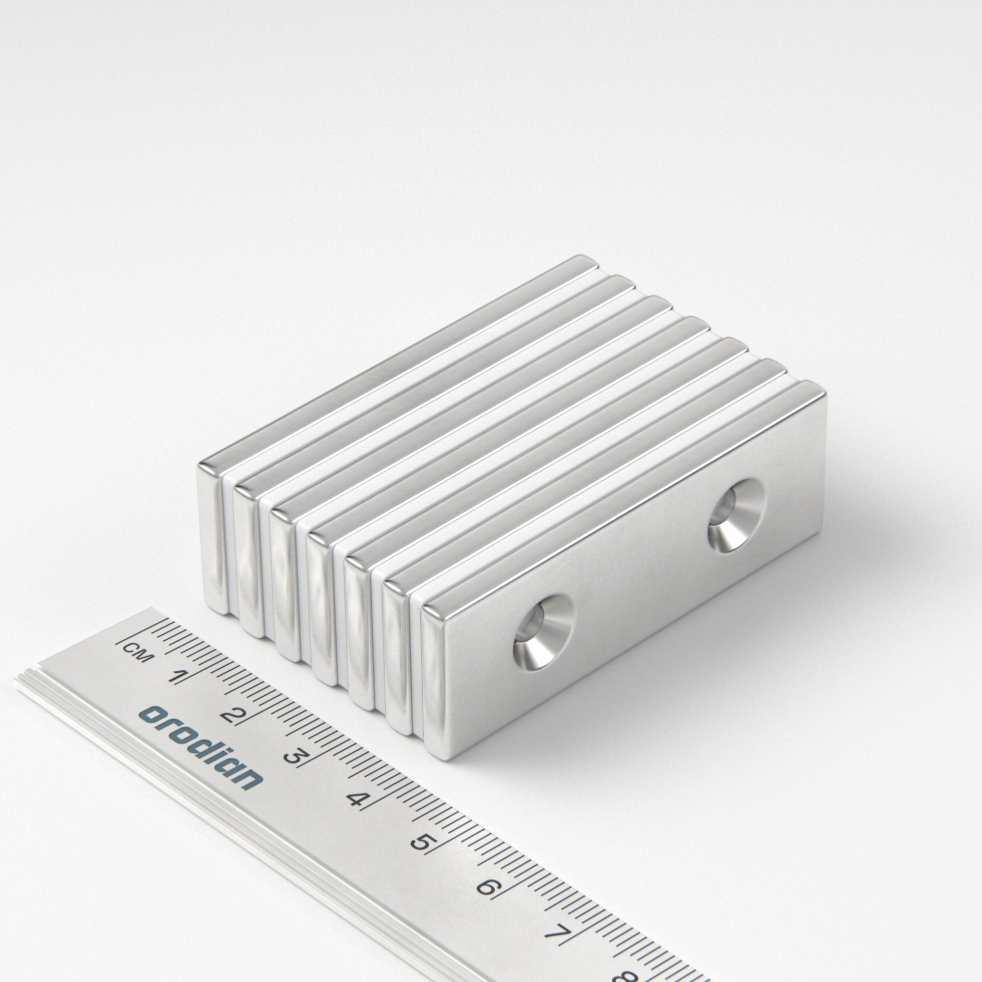 Neodymium magnet, block, 60×20×4 mm, with 2 holes M4 (north pole on the countersunk side) - N38