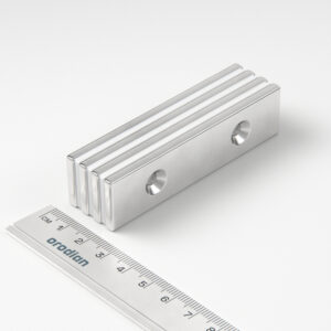 Neodymium magnet, block, 80×20×4 mm, with 2 holes M4 (north pole on the countersunk side) - N38