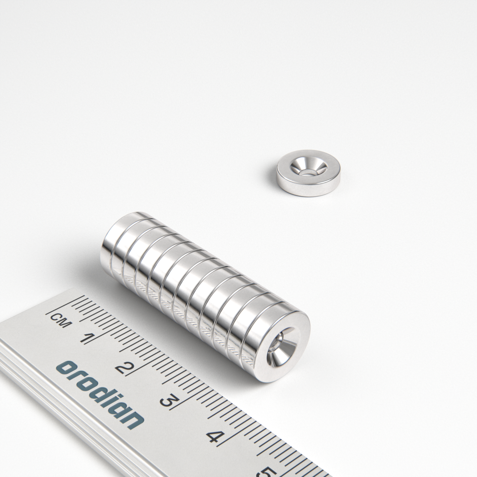 Neodymium magnet, disc, 12×3 mm, with hole M3 (north pole on the countersunk side) - N38