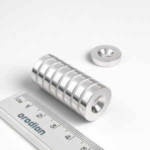 Neodymium magnet, disc, 18×4 mm, with hole M4 (south pole on the countersunk side) - N38