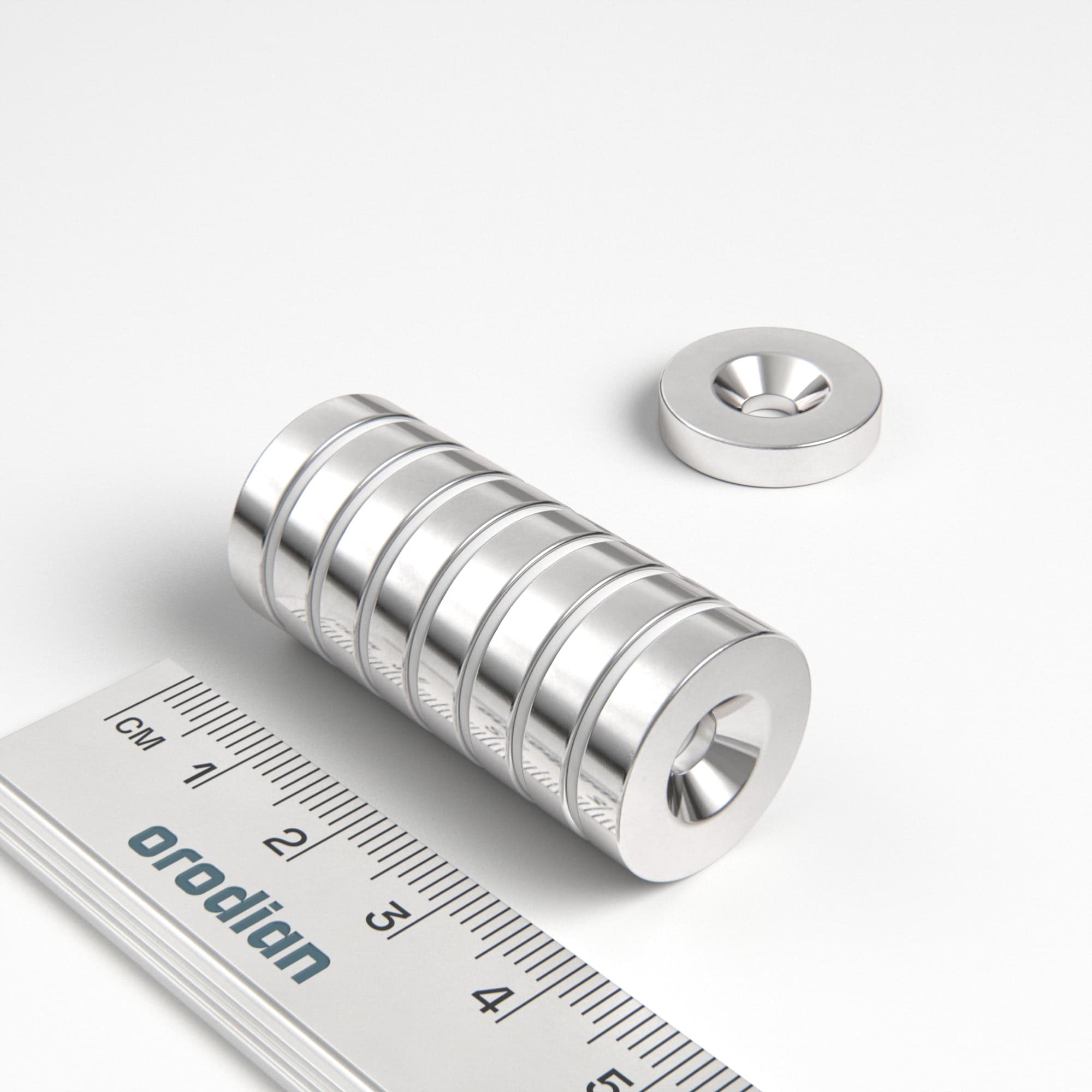 Neodymium magnet, disc, 18×4 mm, with hole M4 (south pole on the countersunk side) - N38