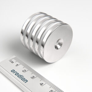 Neodymium magnet, disc, 34×4 mm, with hole M4 (north pole on the countersunk side) - N38