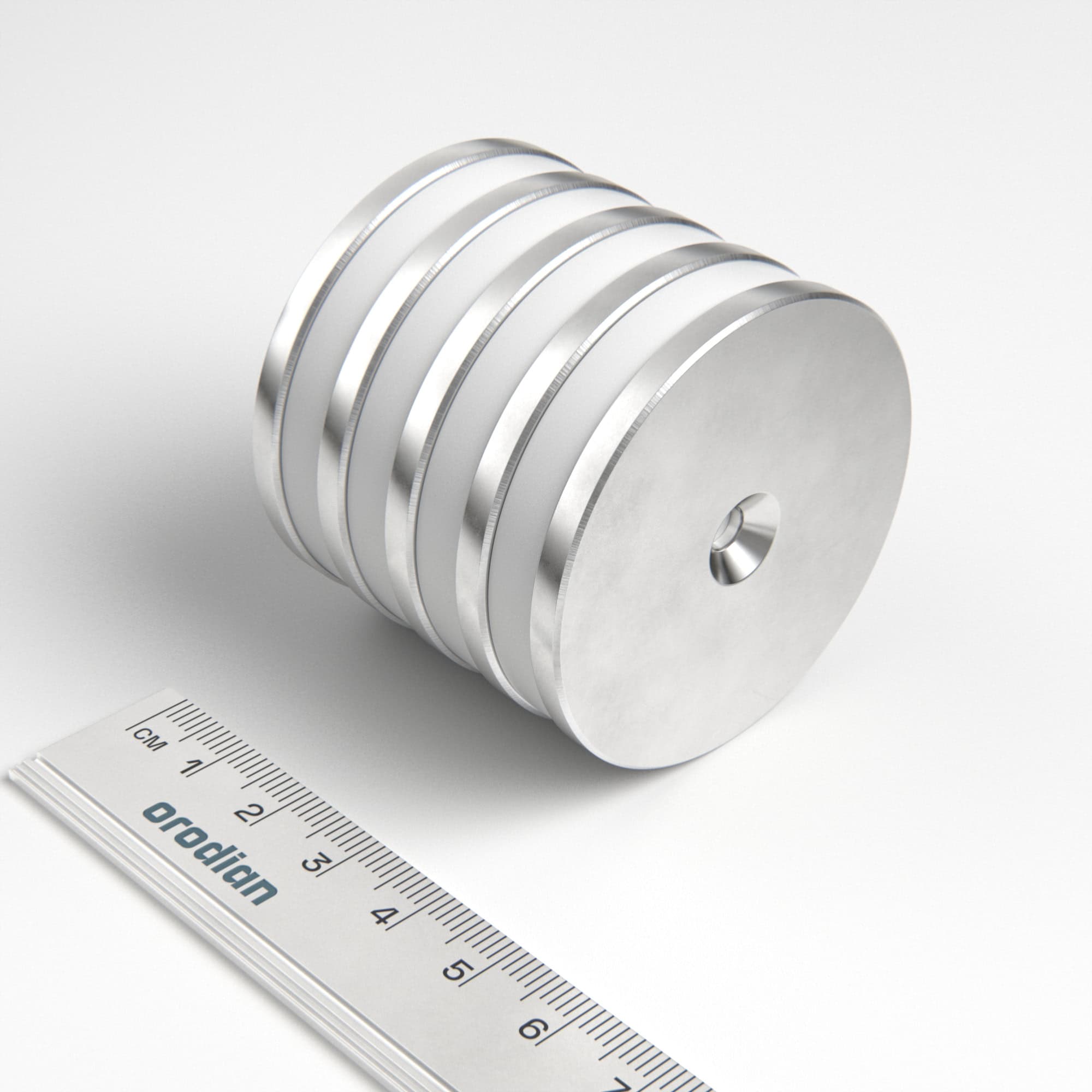 Neodymium magnet, disc, 50×4 mm, with hole M4 (north pole on the countersunk side) - N35