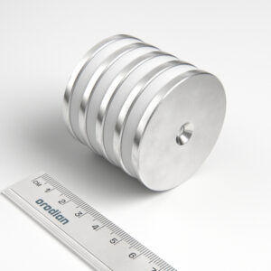 Neodymium magnet, disc, 50×4 mm, with hole M4 (north pole on the countersunk side) - N38